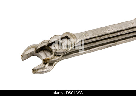 Superposition d'une clé mixte de taille différents outils vis isolé sur fond blanc Banque D'Images