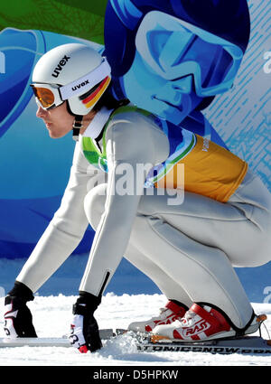 Michael Uhrmann de l'Allemagne réagit à la suite de son dernier saut dans le grand tremplin de saut à ski de l'équipe à la concurrence les Jeux Olympiques de 2010 à Vancouver, Whistler, Canada, 22 février 2010. Photo : Peter Kneffel  + + +(c) afp - Bildfunk + + + Banque D'Images