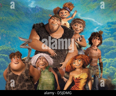 Les CROODS 2013 Twentieth Century Fox Film d'animation avec le sable que prône Grug,bébé, UGA, Thunk, Gran, Eep et Guy Banque D'Images