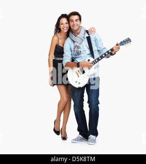 Studio portrait of male guitariste avec ventilateur Banque D'Images