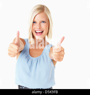 Studio Shot, Portrait of young woman with Thumbs up Banque D'Images