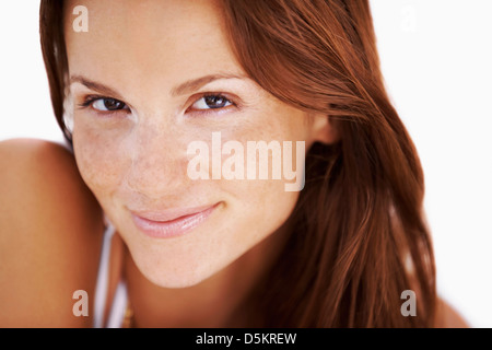 Studio portrait of woman smiling Banque D'Images