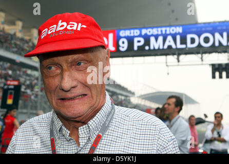 L'ancien Champion du Monde de Formule 1 autrichien Niki Lauda vu avant le début de la Formule Un Grand Prix de l'Inde à la piste de course sur le Circuit International de Buddh, une plus grande Noida, Inde, 28 octobre 2012. Photo : Jens Buettner/dpa Banque D'Images
