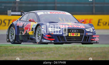 Audi suédois Mattias Ekstrom pilote de course durs au cours de l'échauffement de la première course de la Masters allemand de voitures de tourisme (DTM) à Hockenheim à Hockenheim, Allemagne, 29 avril 2012. Photo : UWE ANSPACH Banque D'Images