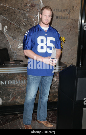 Les Giants de New York à la main l'extrémité Jake Ballard s'allume les lumières pour l'Empire State Building à l'avance de l'équipe entrer dans la Banque D'Images
