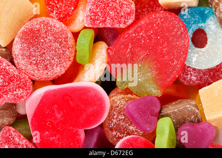 Les tendres bonbons colorés en forme de l'arrière-plan Banque D'Images