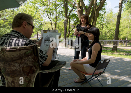 Lviv, Ukraine, l'artiste peint un tourisme local Banque D'Images