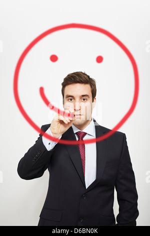 Businessman dimensions smiley dans l'air Banque D'Images