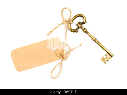 Vintage clé avec un tag pour le texte sur fond blanc Banque D'Images