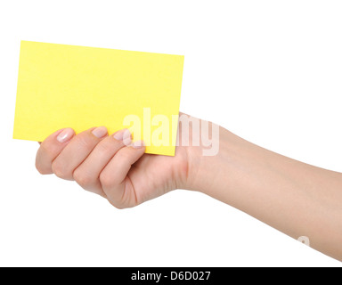 Carte jaune dans une main Banque D'Images