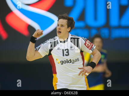 Le Sven-Soeren Christophersen célèbre la victoire 29-24 sur la Suède après le championnat d'Europe de handball EHF match du groupe B entre l'Allemagne et la Suède à Nis, Serbie, 19 janvier 2012. Photo : Jens Wolf Banque D'Images