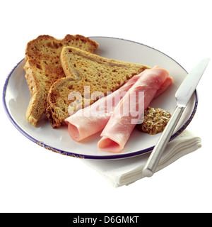 Tranche de jambon avec du pain grillé et une bonne cuillerée de farine de moutarde Banque D'Images