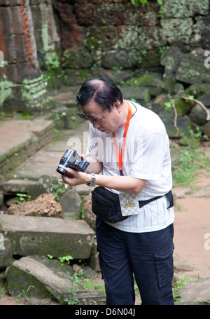 Angkor Wat, au Cambodge, les touristes dans Ta Prohm Banque D'Images