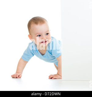 Baby Boy peeking out poster Banque D'Images