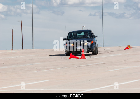 Un Noir 2006 Saturn Ion Redline dans une course automobile autocross régional Sports Car Club of America (SCCA) cas Banque D'Images