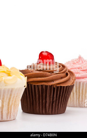 Studio shot of 3 cupcakes sur un fond blanc Banque D'Images