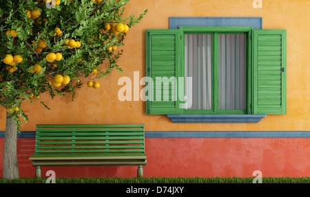 Vieille maison en bois coloré avec fenêtre et banc vert - rendering Banque D'Images