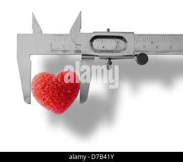 Cœur mesurée avec l'étrier. Isolted sur fond blanc Banque D'Images