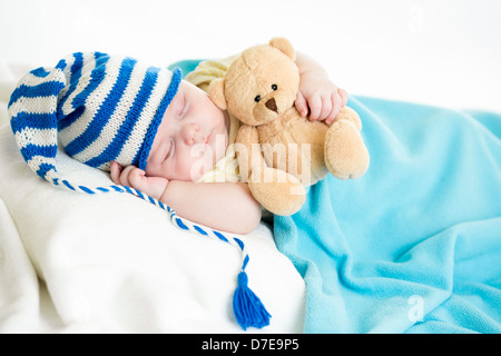 Sleeping Baby Boy with toy Banque D'Images