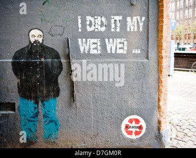 Par Graffiti artiste de rue, Karma, sur un mur à Amsterdam. Banque D'Images