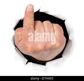 L'homme est montrant ses doigts dans un trou dans du papier blanc Banque D'Images