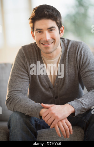 Portrait of mid adult man at home Banque D'Images