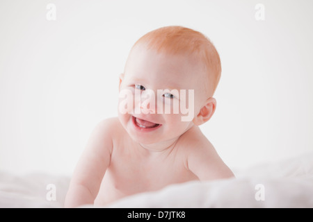 Portrait of Baby Boy (18-23 mois) laughing Banque D'Images