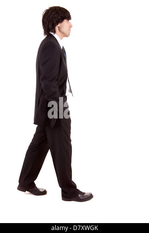 Young business man walking, isolé sur fond blanc Banque D'Images