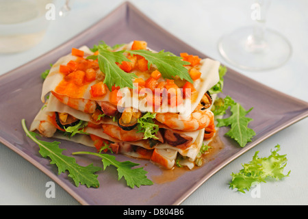 Lasagne froide avec des coquillages. Recette disponible. Banque D'Images