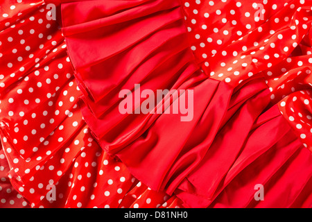 Danseuse de flamenco robe rouge avec des taches typiques de l'Espagne macro détail Banque D'Images