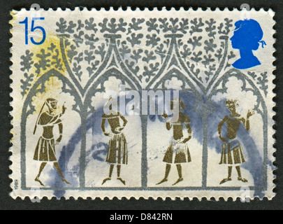 Un timbre imprimé au Royaume-Uni montre image de la 14e siècle paysans du vitrail. 800e anniversaire de la cathédrale d'Ely. Banque D'Images