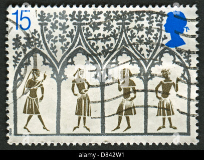 Un timbre imprimé au Royaume-Uni montre image de la 14e siècle paysans du vitrail. 800e anniversaire de la cathédrale d'Ely. Banque D'Images