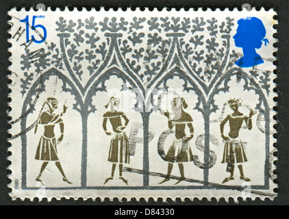 Un timbre imprimé au Royaume-Uni montre image de la 14e siècle paysans du vitrail. 800e anniversaire de la cathédrale d'Ely. Banque D'Images