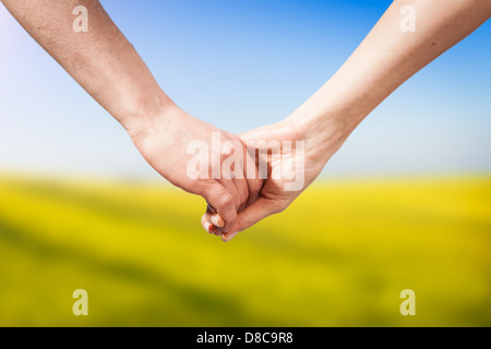 Close-up Holding Hands Banque D'Images