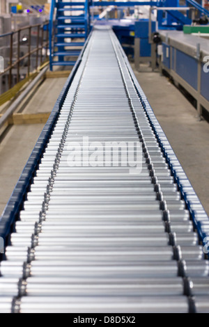 Un convoyeur dans une usine Banque D'Images