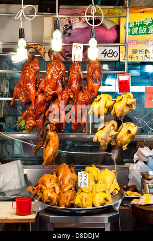 Poulets rôtis étendus dehors un restaurant chinois, Wan Chai, Hong Kong Banque D'Images