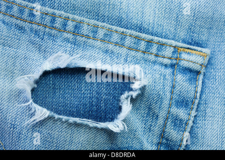 Close up de jeans denim déchiré la texture. Banque D'Images