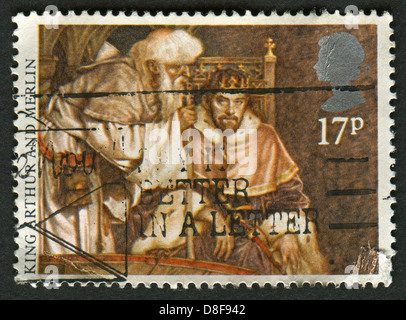 UK - circa 1985 : timbre imprimé au Royaume-Uni montre image du Roi Arthur et Merlin, légendes Arthuriennes, vers 1985. Banque D'Images