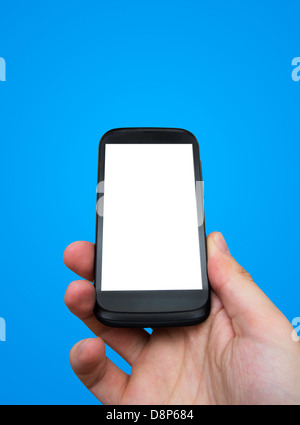 Main tenant le téléphone mobile. Smartphone avec écran vide Banque D'Images