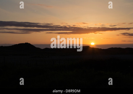 Coucher du soleil à Llangennith sur la péninsule de Gower. Banque D'Images