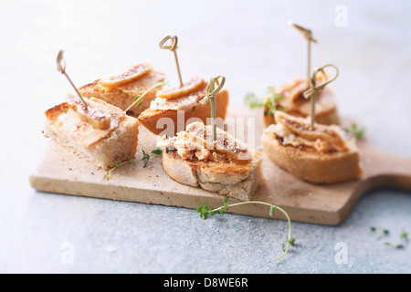 Foie gras et figue bouchées apéritifs Banque D'Images