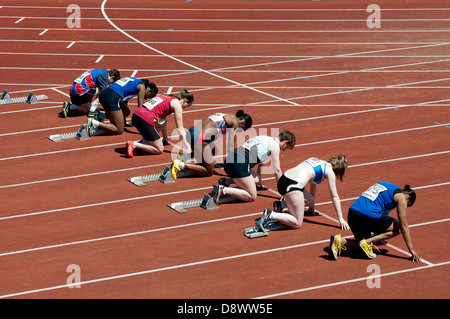 L'athlétisme, les adolescentes 100m. Banque D'Images