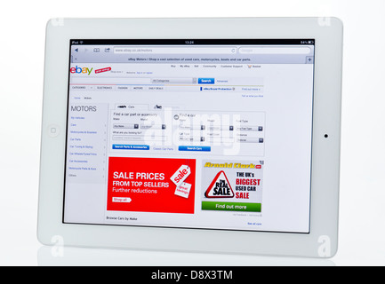 Apple Ipad montrant les moteurs Ebay Site de vente. Banque D'Images