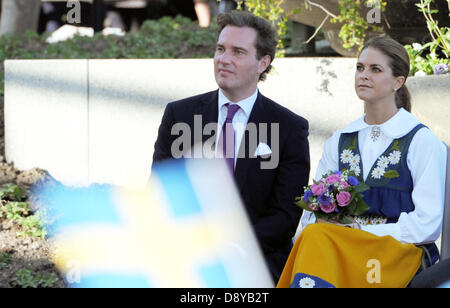 Stockholm, Suède. 6 juin, 2013. La Princesse Madeleine de Suède et son mari-à-être Chris O'Neill à la réception de la fête nationale suédoise à Stockholm, Suède, 6 juin 2013. Photo : Carsten Rehder/dpa Banque D'Images