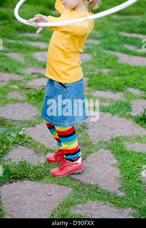Girl hula hoop Banque D'Images