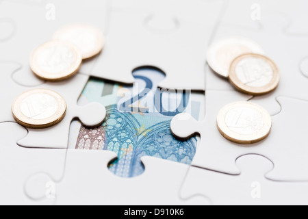 Puzzle révélant billet d'euro Banque D'Images