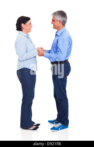 Cheerful couple d'âge moyen isolé sur fond blanc Banque D'Images