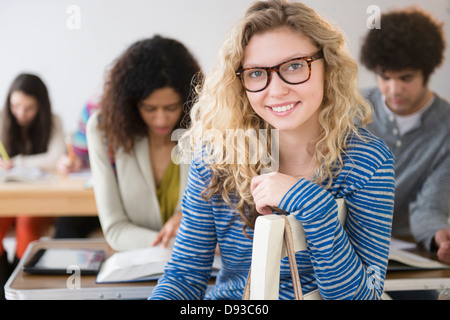 Student smiling in class Banque D'Images