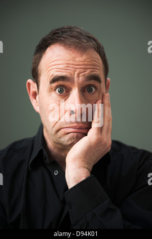 Head and shoulders Portrait of large-eyed Man Banque D'Images