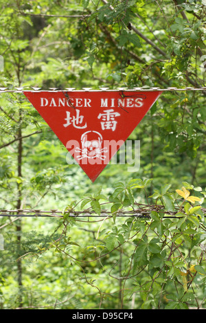 Un champ de mines panneau d'avertissement. Comté de Kinmen, Taiwan Banque D'Images